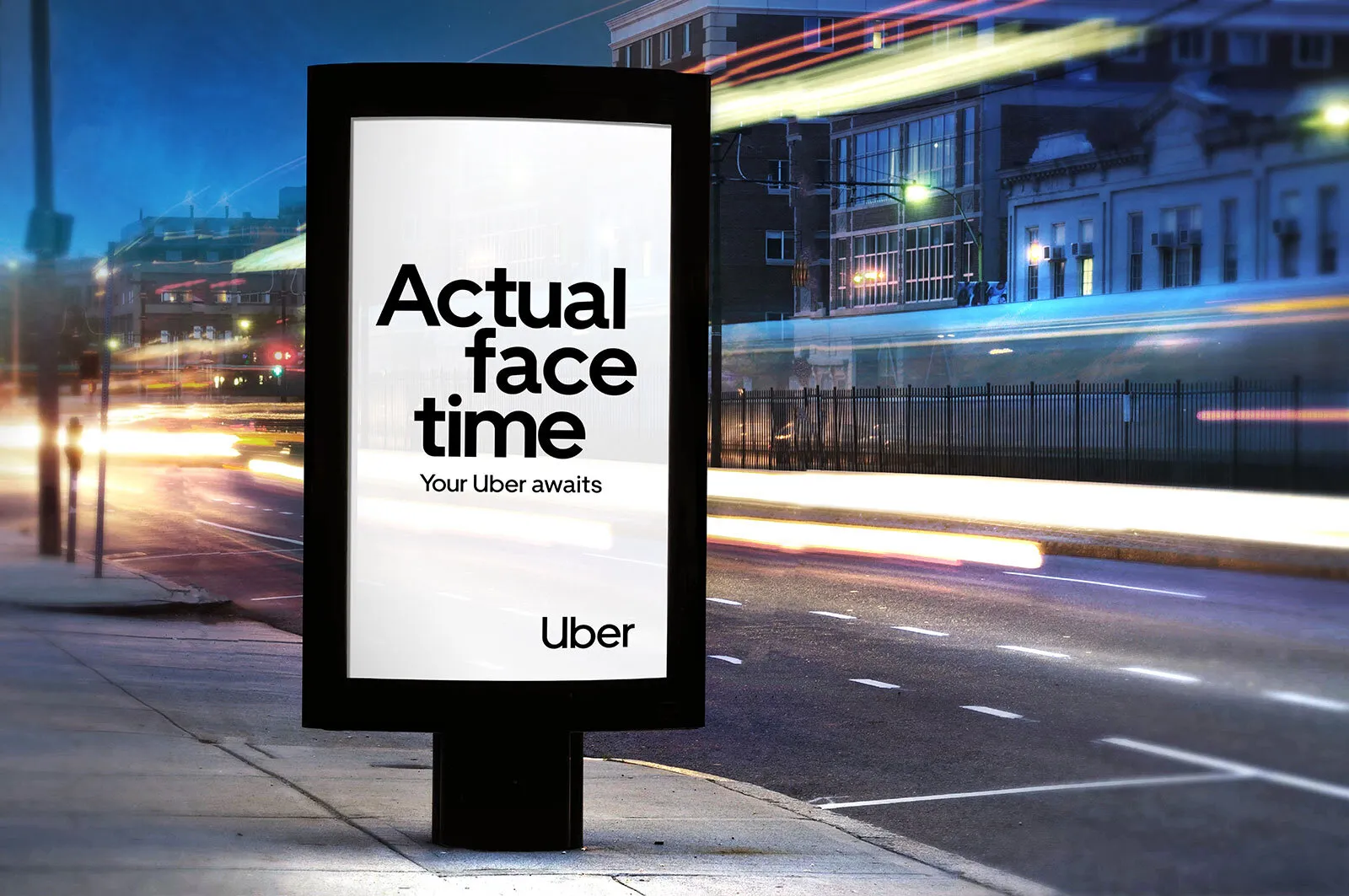 "actual face time" backlit street panel at night, traffic light trails behind