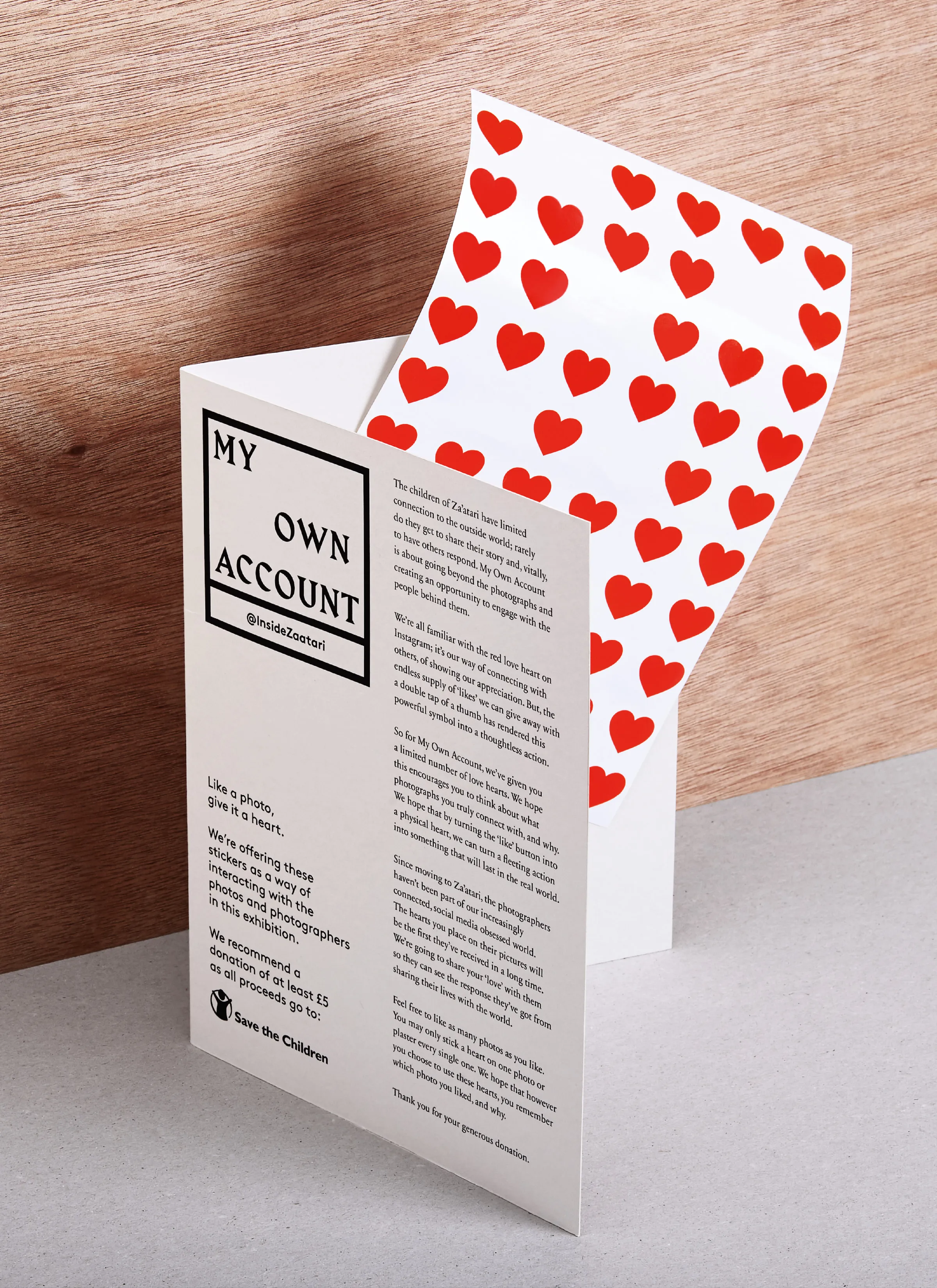 Exhibition leaflet explaining the heart stickers, with the sheet of red hearts